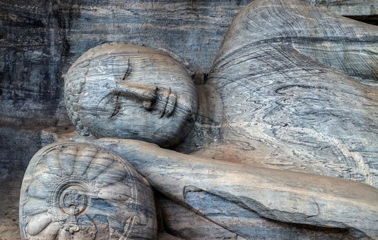 Buddha parinirvana face smile in rock at Gal Vihara, Polonnaruwa, Sri Lanka