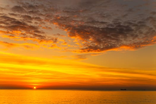 Sunset Gold sea background. Sunset sea waves. Summer sunset morning sky