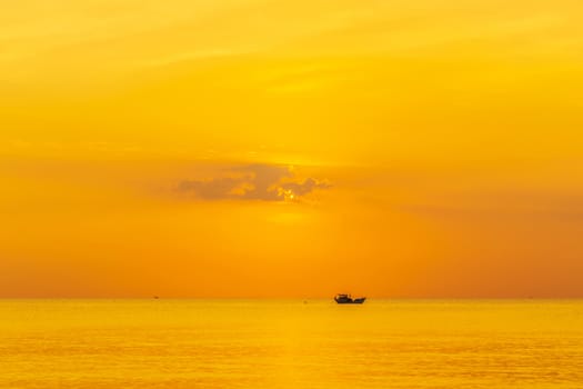 Sky background Sunset fishing boat in the sea