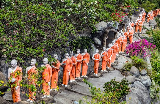 Monk buddhist walking on mountain