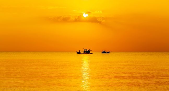 Beautiful seascape clouds over the water, Fishing Boat.