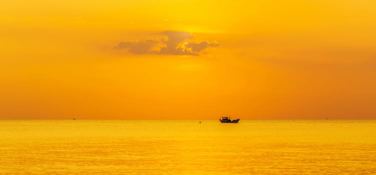 Sky background Sunset fishing boat in the sea