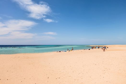 Red Sea Riviera desert landscape, people body coast Ras Muhammad National Park. City of Sharm El Sheikh, Sinai Peninsula. Famous travel destionation in desert Egypt.