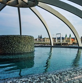 Rooftop thermal pool Rudas Medicinal Thermal Baths hot tub spa by swimming pool, Budapest, Hungary.