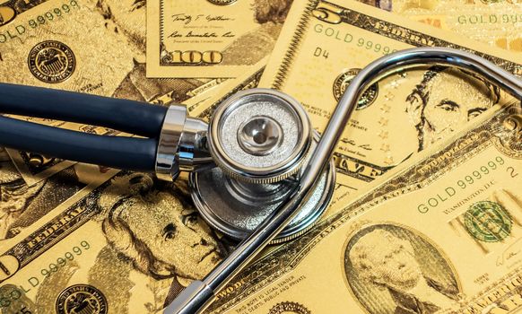 Sprague Rappaport Stethoscope US currency cash note bill design american dollars banknotes money gold fake background Finance business concept