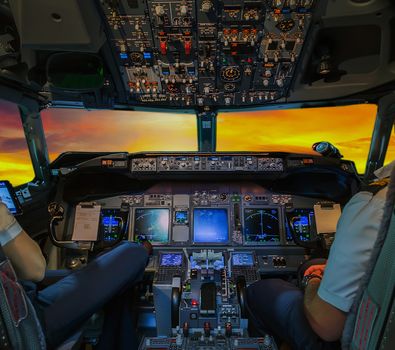 Pilots Airplane Cockpit Flight Deck Aircraft in sunset
