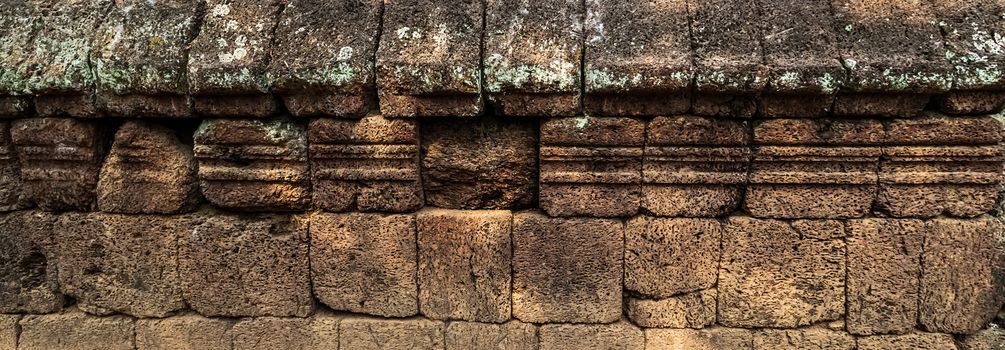 Khmer architecture Detailed carvings on the pink limestone walls of Banteay Srei temple near Angkor wat Siem Reap Cambodia