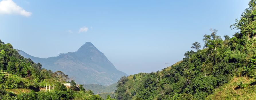 Mountain cloud top view landscape range view. Mountain peak blue sky white clouds panorama. Vietnam landscapes.