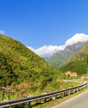 Travel background Highway blue sky in mountains Transportation