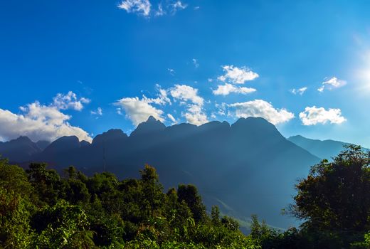 Mountain range sunset view clouds panoramic landscape sky panorama.