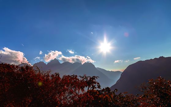 Mountain range sunset view clouds panoramic landscape sky panorama.