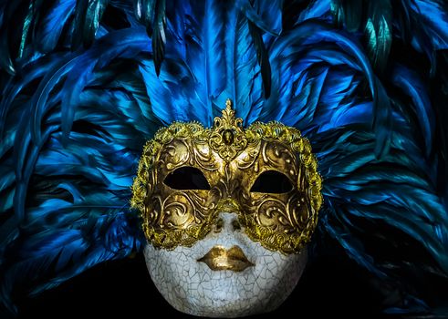 Venetian face masks carnival Venice, Italy coronavirus quarantine on blue flu futuristic background.