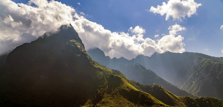 Alps mountain sunny afternoon. Green Wonderful springtime landscape in mountains. Grassy mountain ridge and rolling hills.