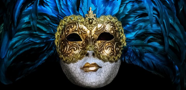 Venetian festival face masks. Carnival of Venice Italy quarantine - coronavirus quarantine COVID-2019 on flu blue futuristic background.