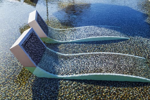 tropical resort hotel with swimming pool. Beach chair tile floor marble ceramic mosaic.