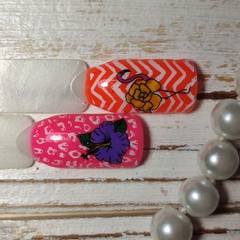 Nail art design wheel. Set of false nails for manicure. Varnish color palette for nail painting.
