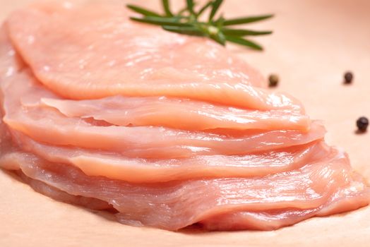 Raw sliced chicken meat close-up. Sotilissimo. Delicious dietary meat. Cooking,food of meat and fillets.