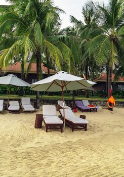 Morning on the beach chairs and white umbrella relax Leisure at sea Phu Quoc island in Vietnam. scene vacation and summer holiday concept.