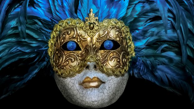 Eye flu strain Coronavirus 2019-nCov novel coronavirus concept Venetian face masks feather carnival Venice. Italy coronavirus quarantine in blue futuristic background.