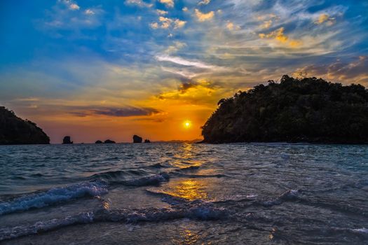 Sea Sunset Beach, paradise evening island. Beauty Scene or sun over colorful sky with clouds Seascape tropical nature background