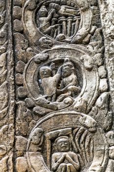 art of ancient Hindu god stone background, detail of the architecture in Bantey Srei temple in the Angkor area, Cambodia.