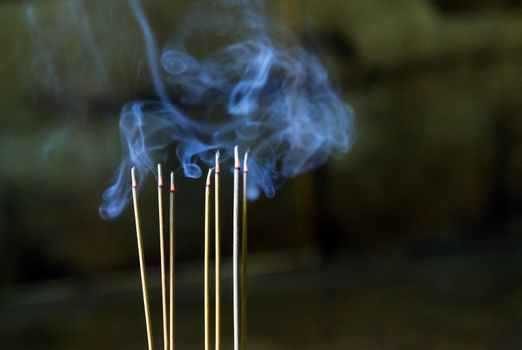 smoke of joss stick in chinese new year of incense in the spirit shrine.