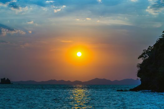 Sea Sunset Beach, paradise evening island. Beauty Scene or sun over colorful sky with clouds Seascape. Tourism travel, vacation concept tropical nature background