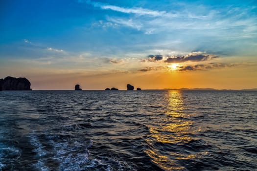 Sea Sunset paradise evening island. Beauty Scene or sun over colorful sky with clouds Seascape. Tourism travel, vacation concept tropical nature background