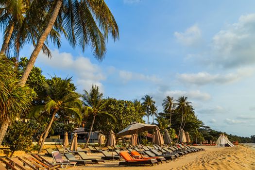 umbrellas and gazebos on sandy beaches - vacation concept tropical nature background