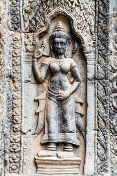Dancing Apsara Decoration Stone Carving on the wall of Angkor wat, Seam Reap, Cambodia