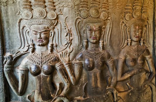Dancing Apsara Decoration Stone Carving on the wall of Angkor wat, Seam Reap, Cambodia