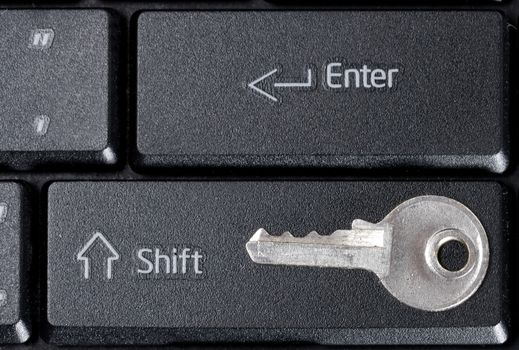 Computer keyboard closeup Enter Shift with key password, concept of pc security, personal access, login, protection technology