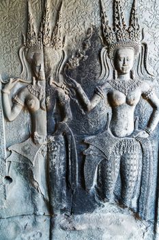 Dancing Apsara Decoration Stone Carving on the wall of Angkor wat, Seam Reap, Cambodia