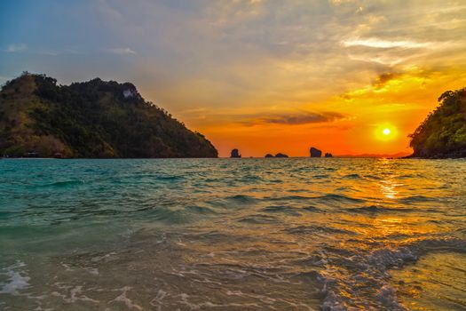 sunrise paradise evening island. Beauty Scene or sun over colorful sky with clouds Seascape tropical nature background