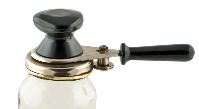 Glass Jar and can lid closing machine for canning isolated on a white background