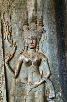 Dancing Apsara Decoration Stone Carving on the wall of Angkor wat, Seam Reap, Cambodia