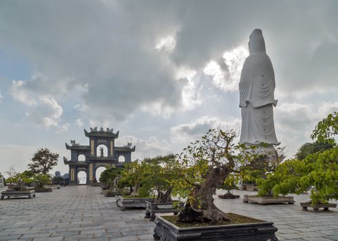 White statue Lady Buddha (the Bodhisattva of Mercy) at the Linh Ung Pagoda, Danang (Da Nang), Vietnam.