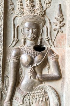 Dancing Apsara Decoration Stone Carving on the wall of Angkor wat, Seam Reap, Cambodia