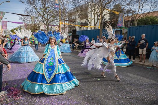 Loule, Portugal - February 25, 2020: dancers parading in the street in front of the public in the parade of the traditional carnival of Loule city on a February day