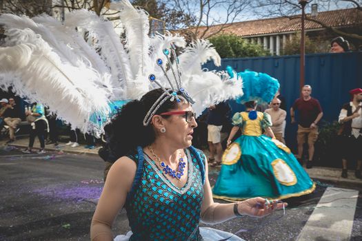 Loule, Portugal - February 25, 2020: dancers parading in the street in front of the public in the parade of the traditional carnival of Loule city on a February day