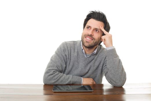 happy man on a desk with a tablet pc, isolated