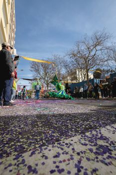 Loule, Portugal - February 25, 2020: dancers parading in the street in front of the public in the parade of the traditional carnival of Loule city on a February day