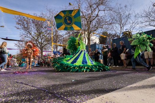 Loule, Portugal - February 25, 2020: dancers parading in the street in front of the public in the parade of the traditional carnival of Loule city on a February day