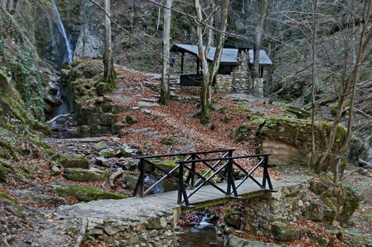 Autumn walk through the labyrinth of the Teteven Balkan with high peaks, river, bridge and waterfall, Stara Planina, Bulgaria