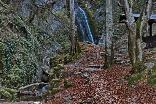 Autumn walk through the labyrinth of the Teteven Balkan with high peaks, river and waterfall, Stara Planina, Bulgaria