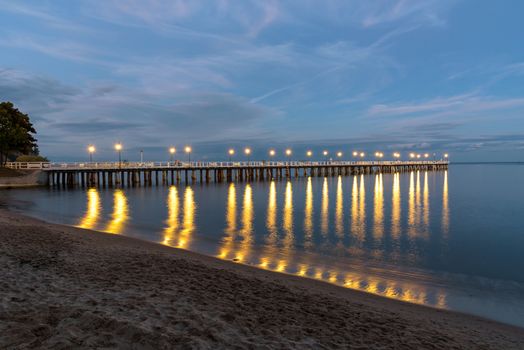 Evening view of wooden pier in Gdynia Orlowo in Poland