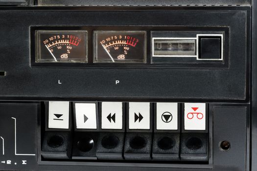 Closeup of control buttons of old audio analog tape recorder