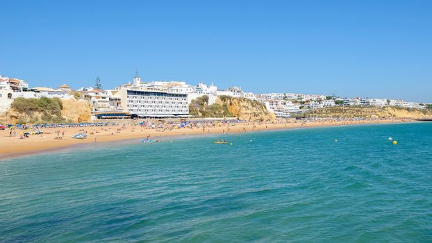 Panoramic view of crowded beach in Albufeira, Algarve, Portugal