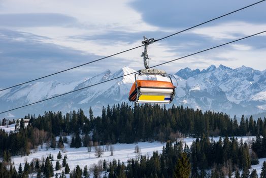 Modern chair lift in ski resort in Tatra Mountains