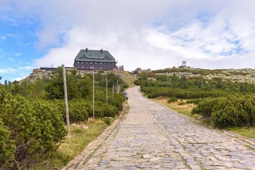 Paved mountain trail to the shelter on the summit of Szrenica mountain in Giant Mountains, Poland